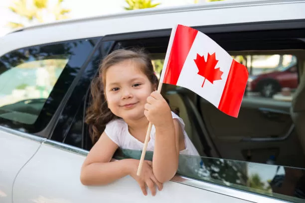 Girl Holding Canadian Flag