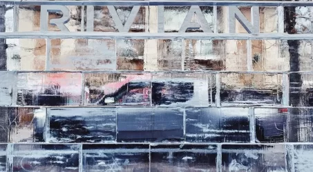 rivian-r1t-electric-truck-behind-ice.webp